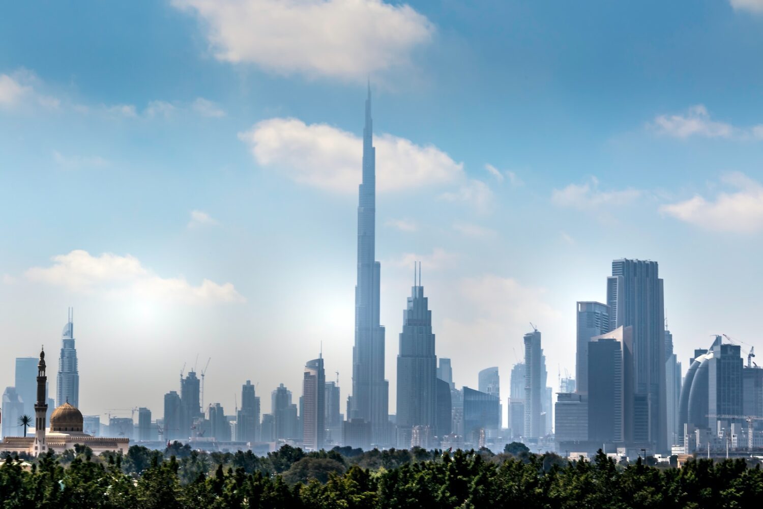 a view of a city with tall buildings